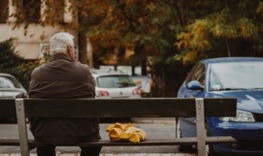 man sitting on bench